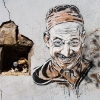 Pochoirs et affiches de C215 sur les murs d'Ivry