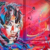 Pochoirs et affiches de C215 sur les murs de Vitry