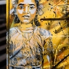 Pochoirs et affiches de C215 sur les murs de Vitry