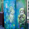 Pochoirs et affiches de C215 sur les murs de Vitry