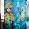 Pochoirs et affiches de C215 sur les murs de Vitry