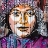 Pochoirs et affiches de C215 sur les murs de Paris