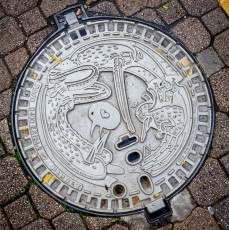 Alëxone - Plaque d'égout - Nancy - Septembre 2022