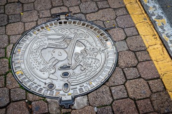 Alëxone - Plaque d'égout - Nancy - Septembre 2022