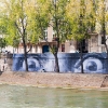 Affichage de JR sur l\'Île Saint-Louis à Paris dans le cadre de son projet